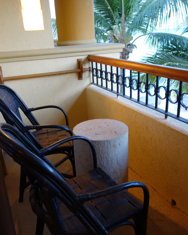 Small balcony with table and two chairs